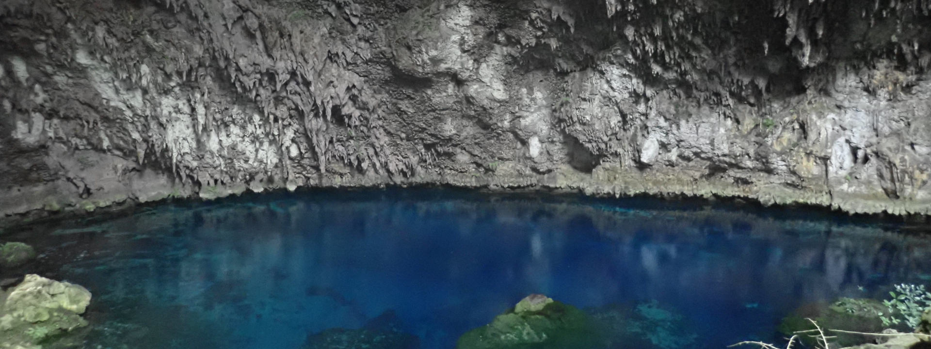 Cave diving exploration technical diver sidemount freshwater cave in Pulau muna. Cave Entry in Wakatobi. Cave diving in indonesia. Pulau Buton or Wakatobi, Sulawesi.