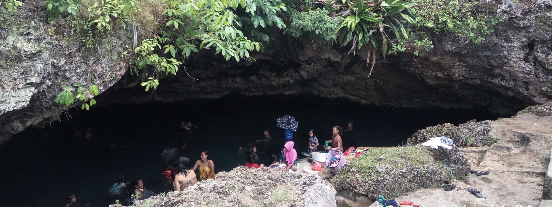 Cave diving exploration technical diver sidemount freshwater cave in Pulau muna. Cave Entry in Wakatobi. Cave diving in indonesia. Pulau Buton or Wakatobi, Sulawesi.